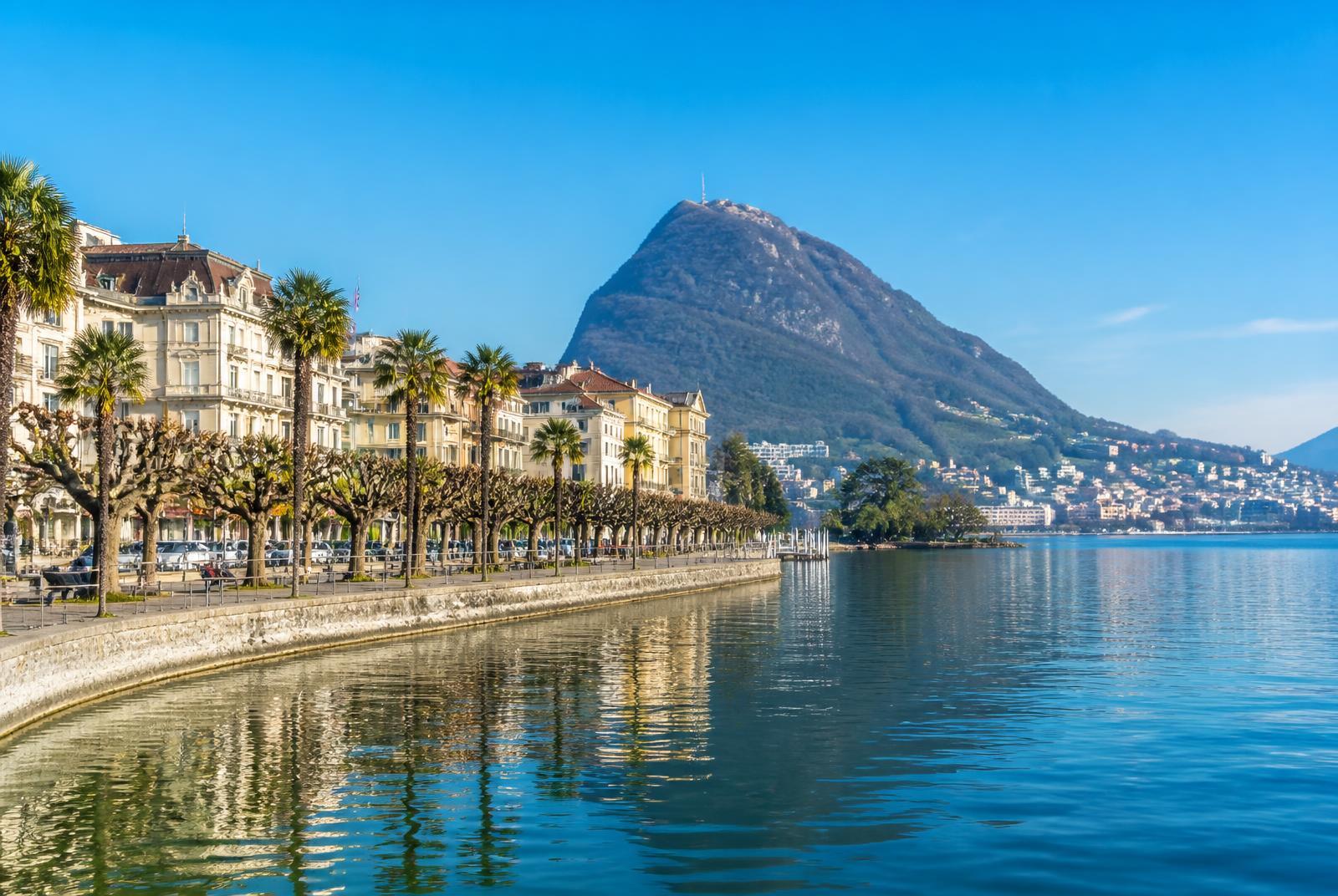 Lugano waterfront on Lake Lugano with Monte San Salvatore behind